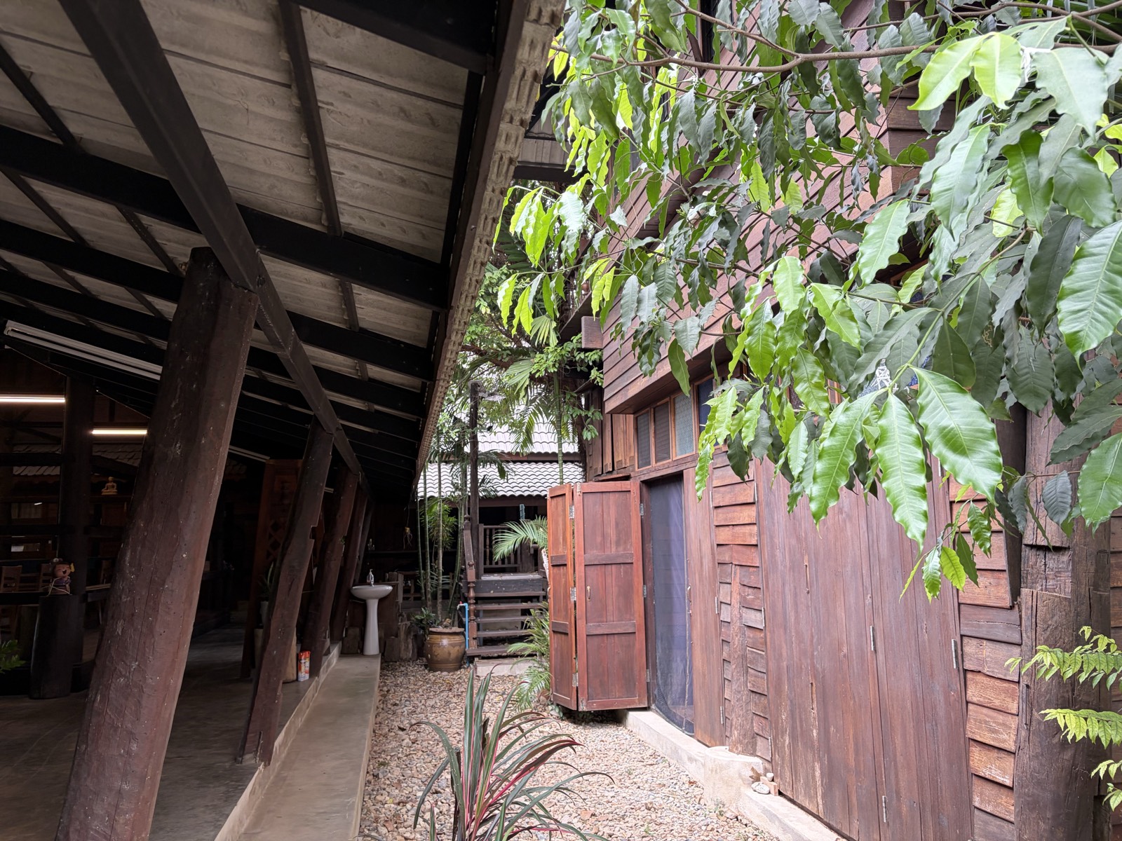 Covered wooden walkway between buildings