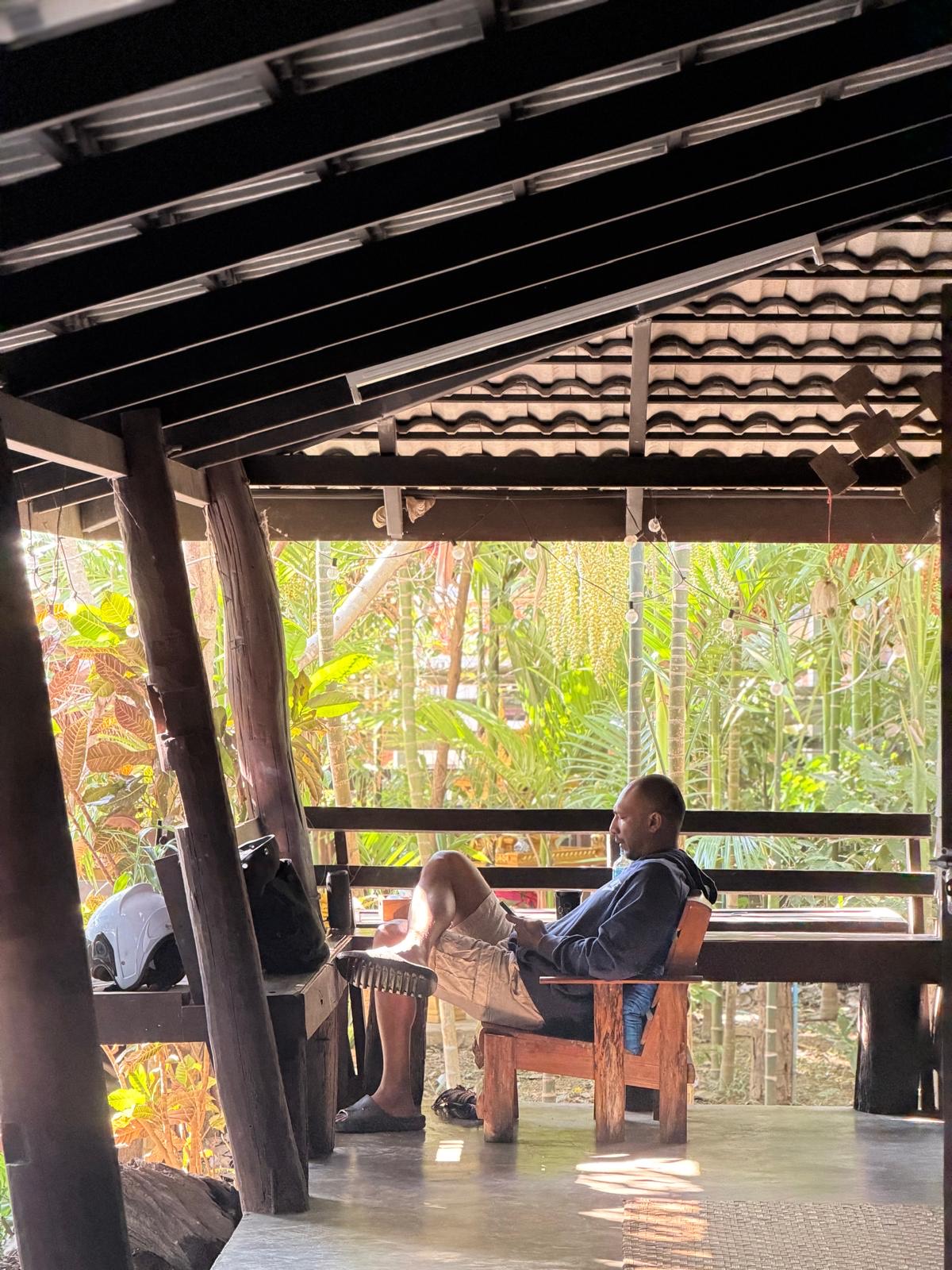 Guest relaxing on covered porch